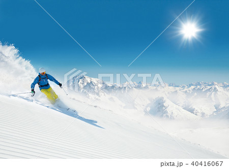 Man skier running downhill Man skier running downhill 40416067