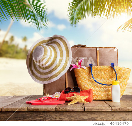 Suitcase and accessories for travelling on wood Suitcase and accessories for travelling on wood 40416470