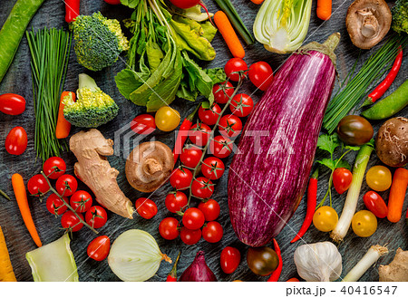 Collection of fresh vegetables on stone Collection of fresh vegetables on stone 40416547