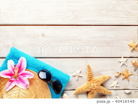 Beach accessories on wooden background 40416549