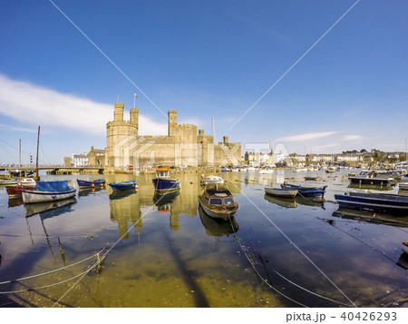 The skyline of Caernafon in Wales during high tide - United Kingdom The skyline of Caernafon in Wales during high tide - United Kingdom 40426293