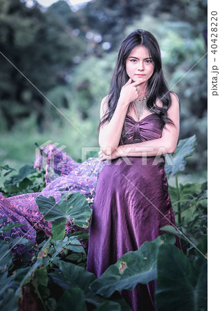 Asia beauty Girl Outdoors enjoying nature. 40428220