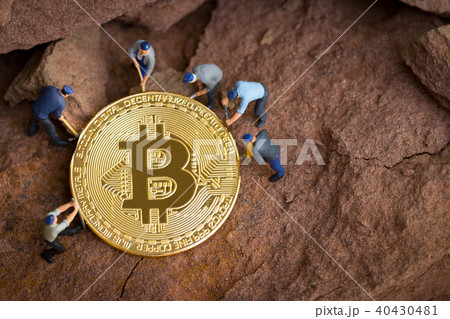 little miner is digging for bitcoin. conceptual  little miner is digging for bitcoin. conceptual  40430481