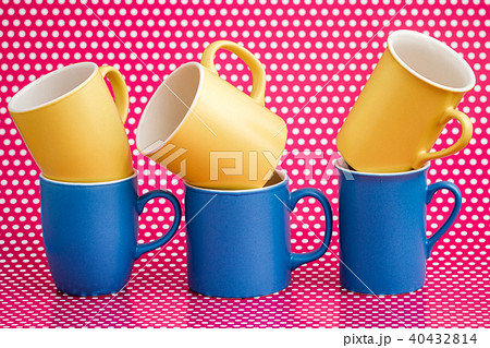 Colorful Coffee Mugs on Pink Background 40432814