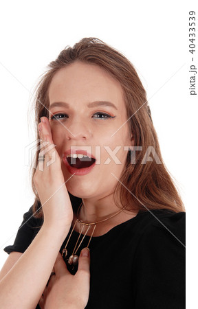 Woman talking behind her hand Woman talking behind her hand 40433539