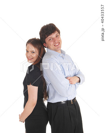 Young couple standing back to back 40433557