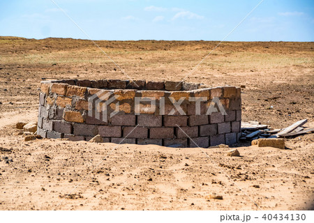 Old well in semi-desert 40434130