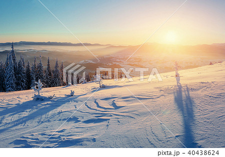 Fantastic winter landscape in the mountains. Magical sunset in a 40438624