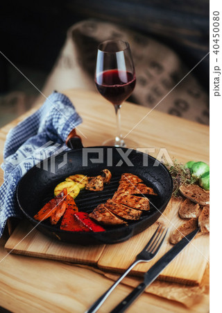Grilled vegetables and chicken fillet. Traditional cuisine. Gril Grilled vegetables and chicken fillet. Traditional cuisine. Gril 40450080