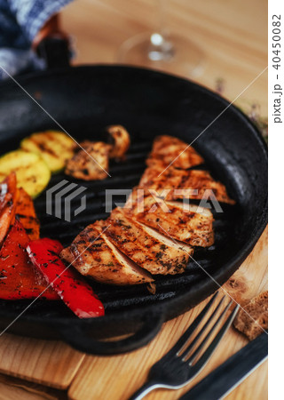 Grilled vegetables and chicken fillet. Traditional cuisine. Gril Grilled vegetables and chicken fillet. Traditional cuisine. Gril 40450082