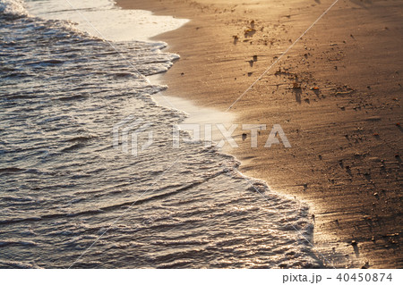 Shiny tropic sea wave on golden beach sand in Shiny tropic sea wave on golden beach sand in 40450874