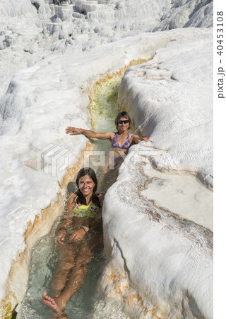 Women in Pamukkale thermal river 40453108