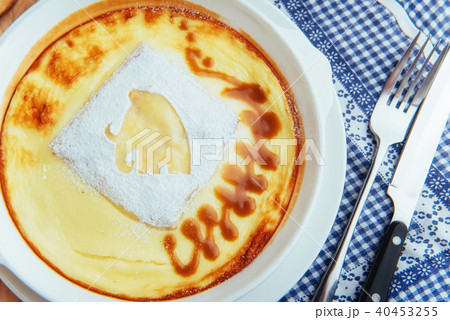 Delicious cheese casserole in a ceramic pot. Delicious cheese casserole in a ceramic pot. 40453255