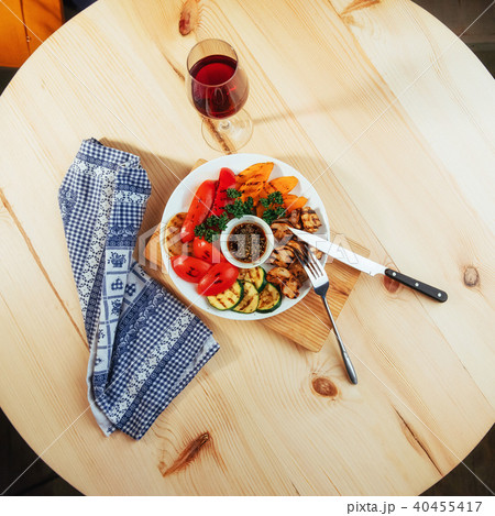 grilled vegetables with sauce on a wooden background grilled vegetables with sauce on a wooden background 40455417