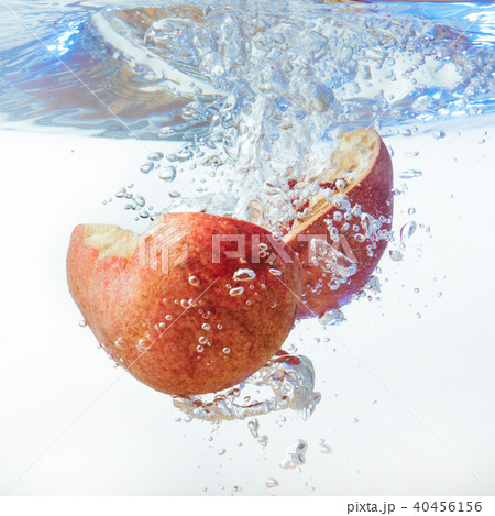 Garnet in the water on a white background Garnet in the water on a white background 40456156