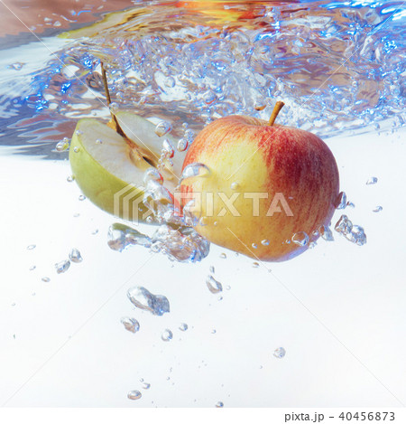 apple in water on a white background 40456873
