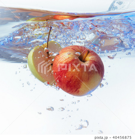 apple in water on a white background 40456875
