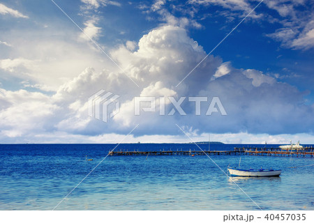 Beautiful summer scene of calm seas and boat Beautiful summer scene of calm seas and boat 40457035