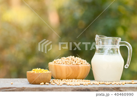 Soy milk and soy beans on wood background. 40460990