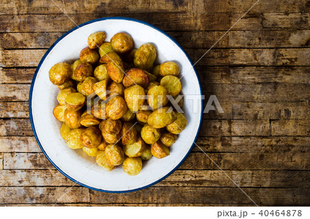 Young potato fried and served on a plate 40464878