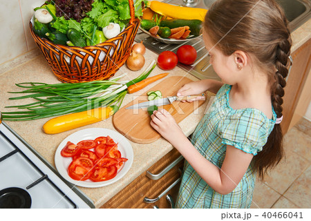 girl posing in home kitchen with fresh fruits girl posing in home kitchen with fresh fruits 40466041