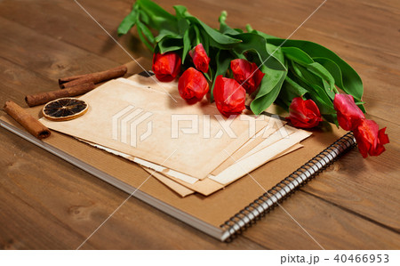tulips are on wooden boards, old sheets paper tulips are on wooden boards, old sheets paper 40466953