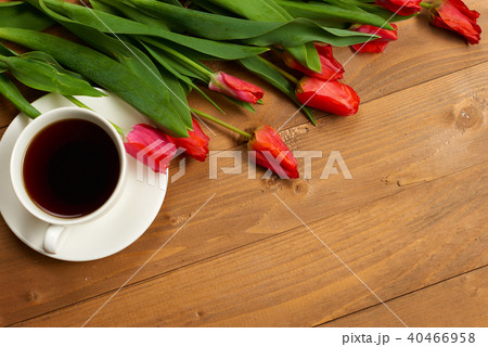 tulips are on wooden boards, cup of coffee tulips are on wooden boards, cup of coffee 40466958