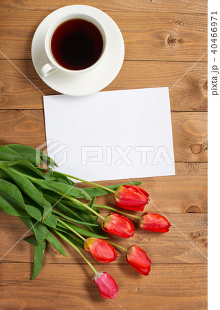 tulips are on wooden boards, cup of coffee tulips are on wooden boards, cup of coffee 40466971