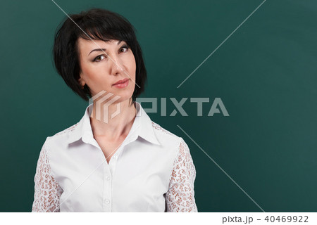 girl teacher posing chalk Board learning concept 40469922