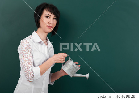 girl teacher posing chalk Board learning concept 40469929