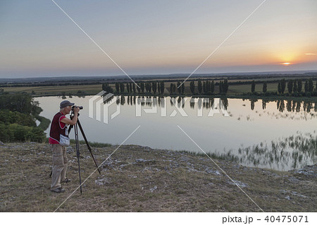 Nature photographer with digital camera. Nature photographer with digital camera. 40475071