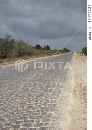 Old cobblestone road. Old cobblestone road. 40475287