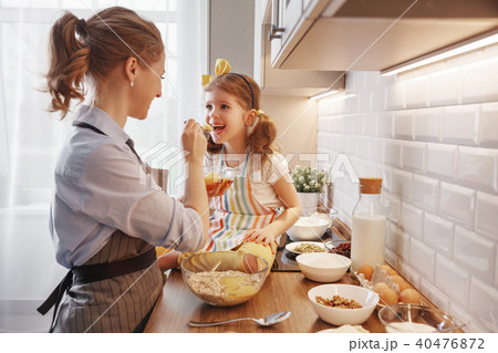 happy family in kitchen. mother and child baking cookies 40476872
