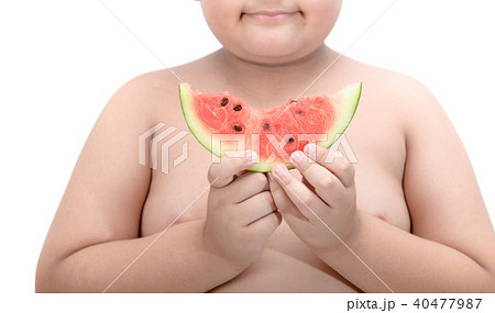 Happy obesity boy holding watermelon 40477987