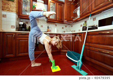Gymnastics during washing floors. Gymnastics during washing floors. 40479395
