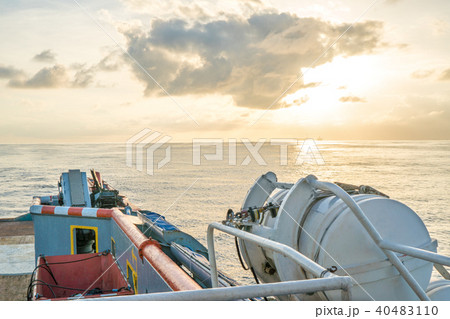 Front view of ocean boat or vessel sailing through calm sea. Freedom concept Front view of ocean boat or vessel sailing through calm sea. Freedom concept 40483110