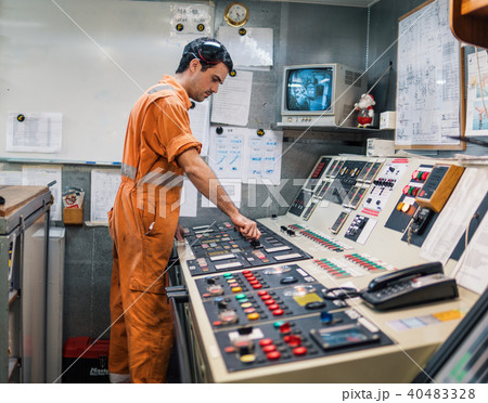 Marine engineer officer starts or stops main engine of ship 40483328