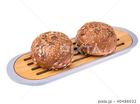 Round whole-wheat rye rolls with flax and sunflower seeds 40486032