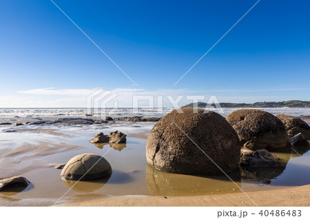 Moeraki Boulders is wonderful rock on the beach. Moeraki Boulders is wonderful rock on the beach. 40486483