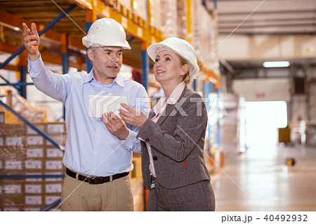 Joyful professional managers working together 40492932