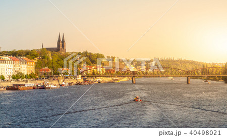 Vysehrad and Railroad Bridge over Vltava on sunny summer evening with sunset. Prague cityscape Vysehrad and Railroad Bridge over Vltava on sunny summer evening with sunset. Prague cityscape 40498021