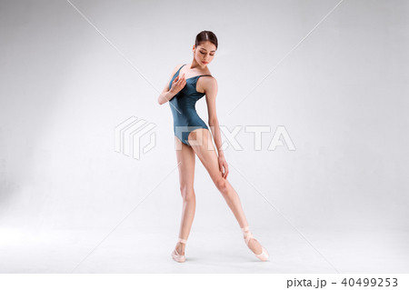 Slim beautiful ballerina on white backgorund Slim beautiful ballerina on white backgorund 40499253