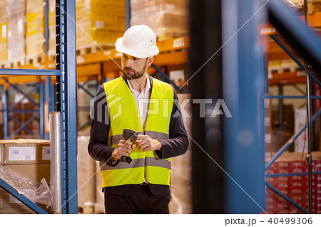 Serious young man checking the inventory 40499306