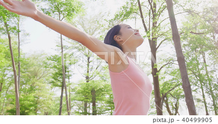 woman feel free in forest 40499905