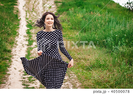 young teenager walking in the nature 40500078