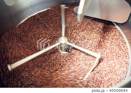 Photo of coffee beans in industrial roaster Photo of coffee beans in industrial roaster 40500694