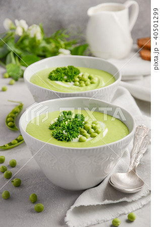 Green pea soup on gray concrete background Green pea soup on gray concrete background 40501299