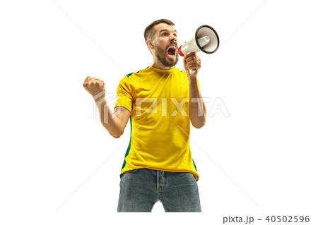Brazilian fan celebrating on white background Brazilian fan celebrating on white background 40502596