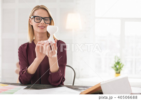 Adorable female designer taking decision Adorable female designer taking decision 40506688