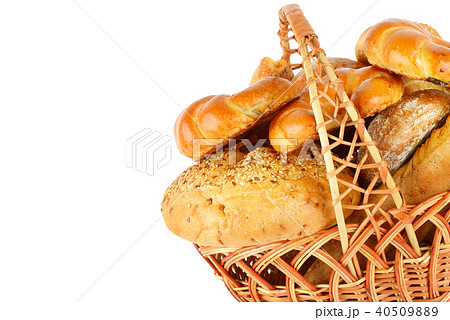 Sweet pastries, bread and flour product in basket  40509889